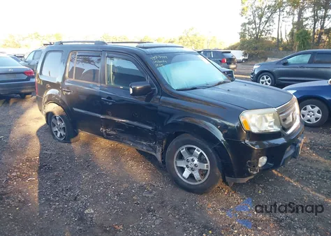 2009 Honda Pilot Touring z USA, uszkodzony, nr VIN 5FNYF48949B014963